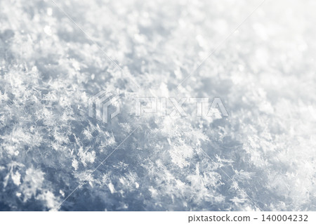 Close-up macro of delicate snowflakes and frost crystals Close-up macro of delicate snowflakes and frost crystals 140004232
