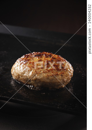 Steaming juicy hamburger steak Steaming juicy hamburger steak 140004282