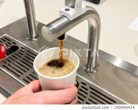 Hot coffee brewed by yourself using a tap coffee (coffee on tap) system. 140004414