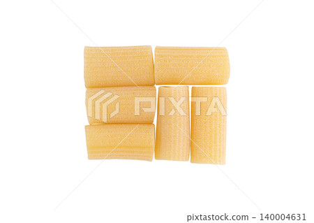 raw rigatoni pasta isolated raw rigatoni pasta isolated 140004631