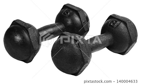 A pair of heavy black cast iron dumbbells with a vintage design and hexagonal edges isolated. Perfect for fitness, weightlifting, and bodybuilding themes. A pair of heavy black cast iron dumbbells with a vintage design and hexagonal edges isolated. Perfect for fitness, weightlifting, and bodybuilding themes. 140004633