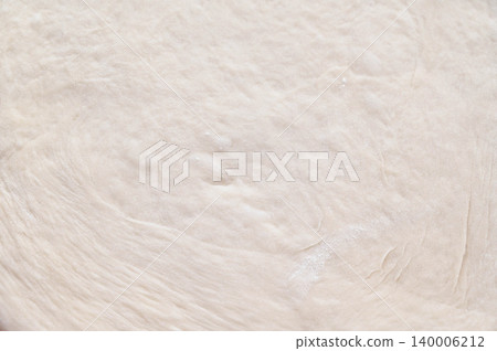 A whole sheet of stretched bread dough A whole sheet of stretched bread dough 140006212