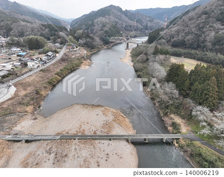 Aerial footage of the Kizugawa Submersible Bridge, a low-water bridge without railings, Kyoto. Aerial footage of the Kizugawa Submersible Bridge, a low-water bridge without railings, Kyoto. 140006219