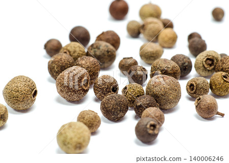 Grains of allspice close-up 140006246