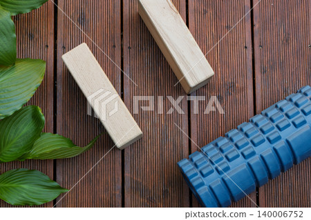 Blue Foam Roller and Wooden Yoga Blocks Blue Foam Roller and Wooden Yoga Blocks 140006752