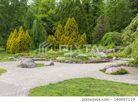 Public Park Stone Plaza Landscape with Terraced Rock Garden and Conifers 140007119