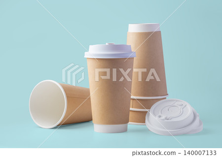 Paper takeaway coffee cups with lids mockup on pastel blue background 140007133