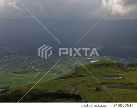 Aerial photograph showing the grasslands, hills, and farmlands of Minami Aso, Kumamoto Prefecture. Aerial photograph showing the grasslands, hills, and farmlands of Minami Aso, Kumamoto Prefecture. 140007615