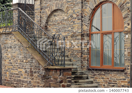 middle age old brick building stair case porch facade walls and hand rail perspective background middle age old brick building stair case porch facade walls and hand rail perspective background 140007743
