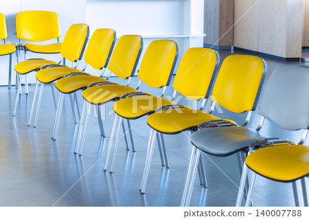 lobby indoor space with chairs row yellow color furniture perspective point view lobby indoor space with chairs row yellow color furniture perspective point view 140007788