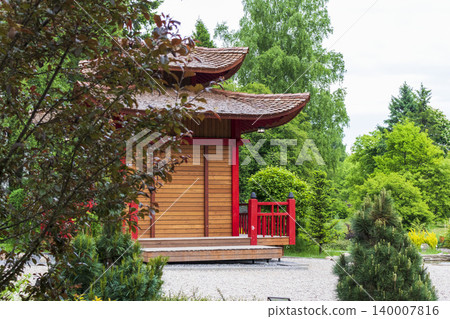 Traditional Japanese Teahouse Pavilion with Red Pillars and Shoji Doors Traditional Japanese Teahouse Pavilion with Red Pillars and Shoji Doors 140007816