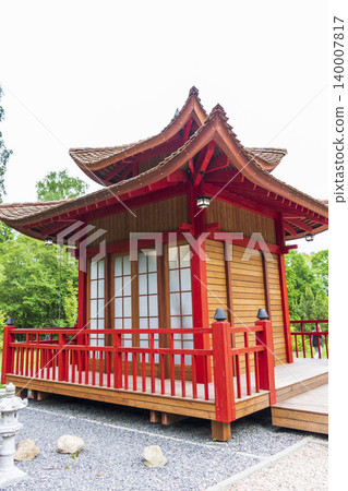 Traditional Japanese Teahouse Pavilion with Red Pillars and Shoji Doors 140007817