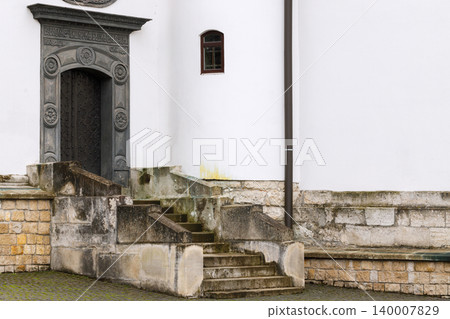 church entrance door porch part of building local external side background white wall and stairs ancient church entrance door porch part of building local external side background white wall and stairs ancient 140007829