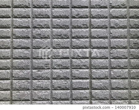 Uneven block exterior wall with rectangular cutouts. Uneven block exterior wall with rectangular cutouts. 140007910