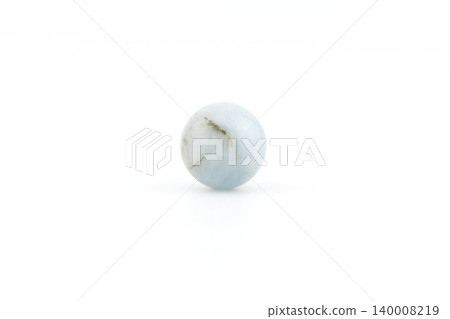 Beautiful aquamarine stone on a plain background Beautiful aquamarine stone on a plain background 140008219