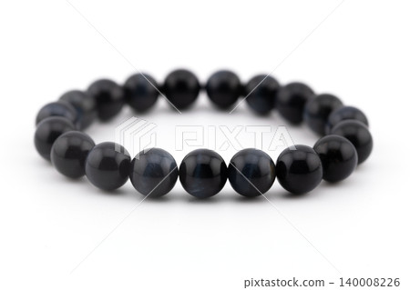 Blue tiger eye natural stone bracelet on a white background 140008226