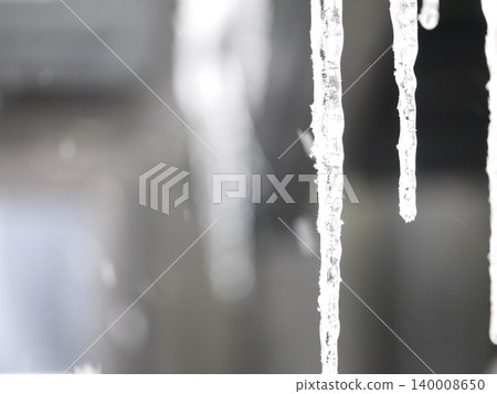 Icicles hanging from the roof Icicles hanging from the roof 140008650