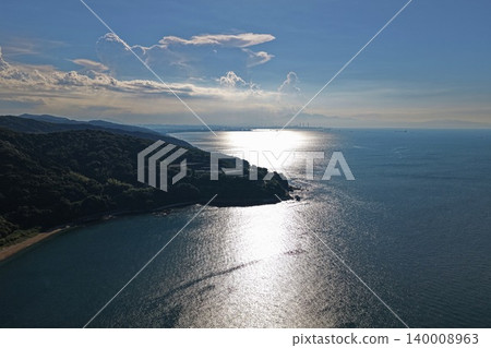 Aerial photograph of a forest-covered cape in Saganoseki, Oita Prefecture, overlooking the Seto Inland Sea. Aerial photograph of a forest-covered cape in Saganoseki, Oita Prefecture, overlooking the Seto Inland Sea. 140008963
