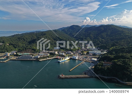 Aerial photograph overlooking Saganoseki Port and ferry terminal in Oita Prefecture. Aerial photograph overlooking Saganoseki Port and ferry terminal in Oita Prefecture. 140008974