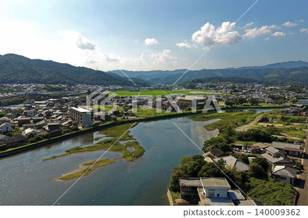 An aerial photograph overlooking the city and river of Usuki, Oita Prefecture. An aerial photograph overlooking the city and river of Usuki, Oita Prefecture. 140009362