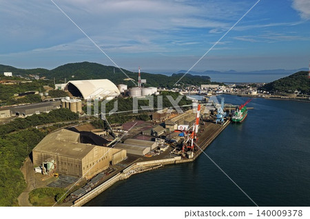 Aerial photograph capturing the industrial port and cargo ships of Saganoseki, Oita Prefecture. 140009378