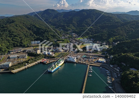 An aerial photograph overlooking the ferry and port town of Saganoseki Port in Oita Prefecture. An aerial photograph overlooking the ferry and port town of Saganoseki Port in Oita Prefecture. 140009402