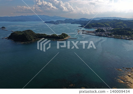 Aerial photograph overlooking the remote islands and fishing port of Usuki City, Oita Prefecture. Aerial photograph overlooking the remote islands and fishing port of Usuki City, Oita Prefecture. 140009434