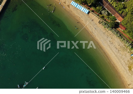 An aerial photograph overlooking the sandy beach and clear sea of Usuki City, Oita Prefecture. An aerial photograph overlooking the sandy beach and clear sea of Usuki City, Oita Prefecture. 140009466