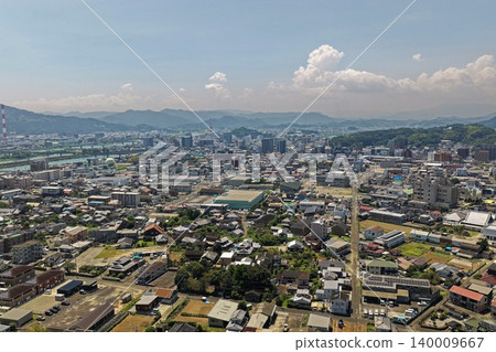 Aerial photograph showing the city and mountain range of Nobeoka, Miyazaki Prefecture. 140009667