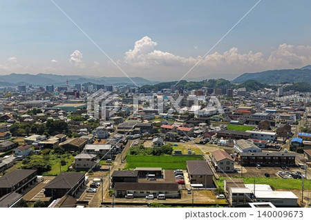 Aerial photograph showing the city and mountain range of Nobeoka, Miyazaki Prefecture. Aerial photograph showing the city and mountain range of Nobeoka, Miyazaki Prefecture. 140009673