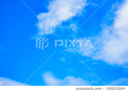 White clouds floating in the blue sky White clouds floating in the blue sky 140010084