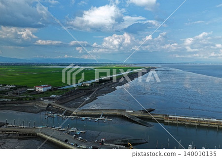 Aerial photograph of Shin-Ariake Fishing Port and the Ariake Sea reclaimed land in Kishima District, Saga Prefecture. Aerial photograph of Shin-Ariake Fishing Port and the Ariake Sea reclaimed land in Kishima District, Saga Prefecture. 140010135