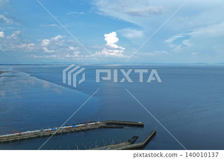 An aerial photograph overlooking the area around Shin-Ariake Fishing Port in Kishima District, Saga Prefecture, and the Ariake Sea. An aerial photograph overlooking the area around Shin-Ariake Fishing Port in Kishima District, Saga Prefecture, and the Ariake Sea. 140010137