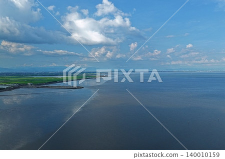 An aerial photograph overlooking the Ariake Sea and reclaimed land near Shin-Ariake Fishing Port in Kishima District, Saga Prefecture. An aerial photograph overlooking the Ariake Sea and reclaimed land near Shin-Ariake Fishing Port in Kishima District, Saga Prefecture. 140010159