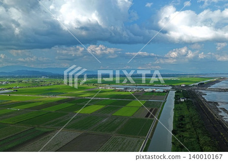 An aerial photograph overlooking the reclaimed land and irrigation canals near Shin-Ariake Fishing Port in Kishima District, Saga Prefecture. An aerial photograph overlooking the reclaimed land and irrigation canals near Shin-Ariake Fishing Port in Kishima District, Saga Prefecture. 140010167