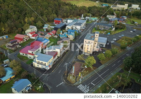 An aerial photograph showing a diagonal view of the hot spring town of Toyotomi Onsen in Hokkaido. An aerial photograph showing a diagonal view of the hot spring town of Toyotomi Onsen in Hokkaido. 140010202
