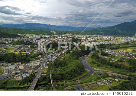 An aerial photograph overlooking the town and river of Nakanojo, Gunma Prefecture. An aerial photograph overlooking the town and river of Nakanojo, Gunma Prefecture. 140010231