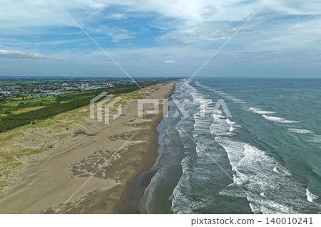 An aerial photograph overlooking the coastline of Minamihama Beach in Sanmu City, Chiba Prefecture. An aerial photograph overlooking the coastline of Minamihama Beach in Sanmu City, Chiba Prefecture. 140010241
