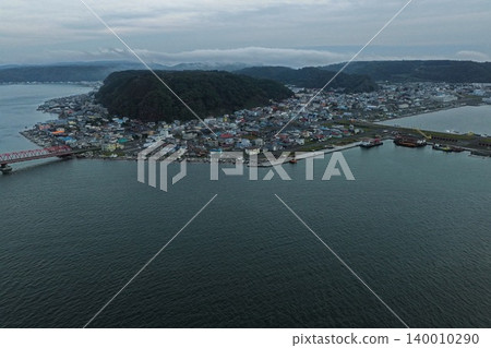 An aerial photograph overlooking the fishing port and town of Akkeshi, Hokkaido. 140010290
