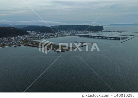 Aerial photograph of the fishing port and port facilities in Akkeshi Town, Hokkaido. Aerial photograph of the fishing port and port facilities in Akkeshi Town, Hokkaido. 140010293