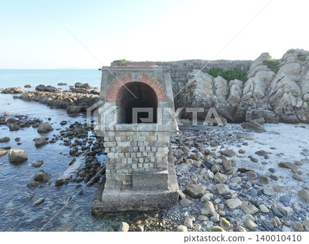 Eboshi Pit, a coal mine ruin on the East China Sea coast: Aerial footage of the evening view. Eboshi Pit, a coal mine ruin on the East China Sea coast: Aerial footage of the evening view. 140010410