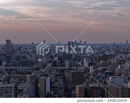 An aerial photograph of the urban area of Koto Ward, Tokyo, taken at dusk. An aerial photograph of the urban area of Koto Ward, Tokyo, taken at dusk. 140010459