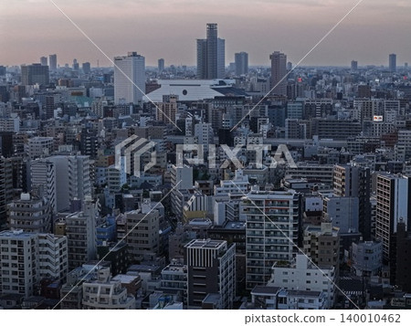 Aerial photograph taken at dusk overlooking the city and stadium in Koto Ward, Tokyo. Aerial photograph taken at dusk overlooking the city and stadium in Koto Ward, Tokyo. 140010462