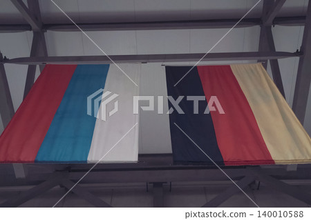 Russian and German flag nearby. 140010588