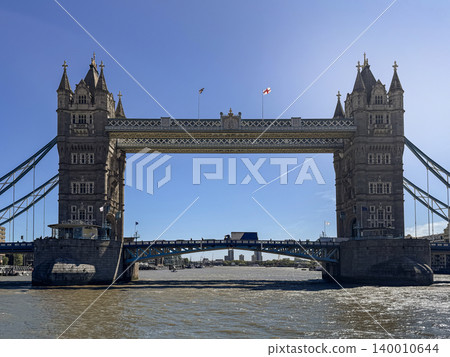 Tower Bridge London Over the River Thames With Blue Sky and Historic Victorian Architecture Tower Bridge London Over the River Thames With Blue Sky and Historic Victorian Architecture 140010644