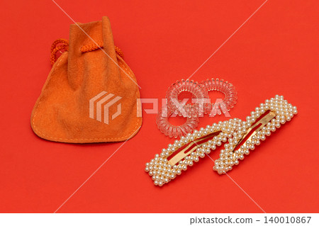 Hair accessories on red background Hair accessories on red background 140010867