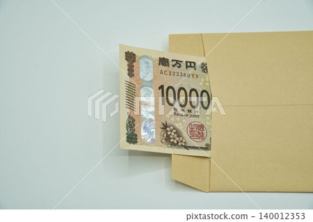 Money in a cardboard box Money in a cardboard box 140012353