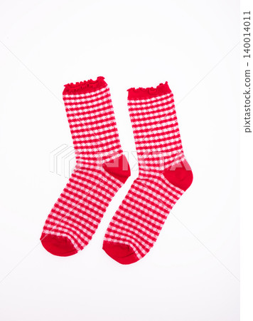 Red socks on an isolated white background Red socks on an isolated white background 140014011