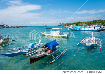 Fishing boats in Bira harbor, Sulawesi, Indonesia on clear day Fishing boats in Bira harbor, Sulawesi, Indonesia on clear day 140014561