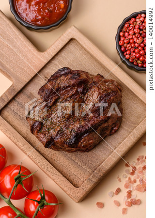 Beef mignon steak, rare, meat grilled with salt and spices. Beef steak 140014992